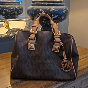 Michael kors signature Boston bag with gold hardware. As new condition